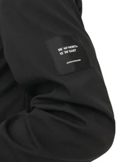 Blouson à manches longues noir uni avec une coupe droite et un col à capuche