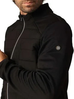 Blouson marine avec un col montant zippé et logo de la marque sur une manche