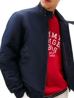 Blouson marine à coupe ajustée pourvu d'un col boutonné et de manches longues