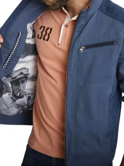 Blouson marine uni avec une coupe ajustée et une fermeture zippée
