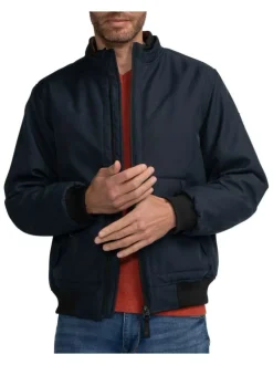 Blouson marine uni avec une coupe droite, col montant et fermeture zippée