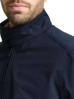 Blouson marine uni avec une coupe droite et deux poches raglan à l’avant