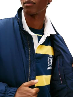 Blouson marine uni avec une coupe droite et un col montant