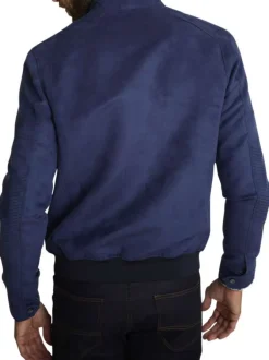 Blouson marine uni avec une coupe droite et un col montant avec un bouton
