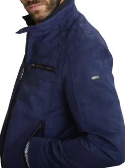 Blouson marine uni avec une coupe droite et un col montant avec un bouton