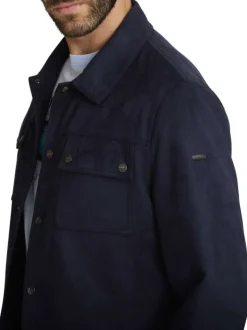 Blouson marine uni avec une coupe droite et une fermeture boutonnée