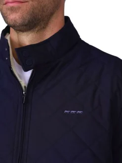 Blouson marine uni avec une coupe droite et un logo brodé à la poitrine