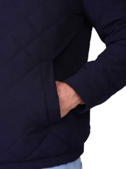 Blouson marine uni avec une coupe droite et un logo brodé à la poitrine
