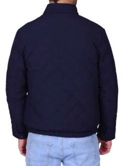 Blouson marine uni avec une coupe droite et un logo brodé à la poitrine