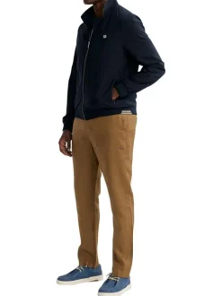 Blouson marine uni pourvu d'une coupe droite et d'un col montant