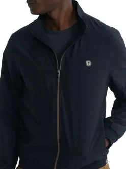 Blouson marine uni pourvu d'une coupe droite et d'un col montant