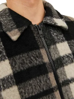 Blouson marron à carreaux avec une coupe droite et un col italien