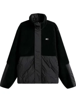 Blouson noir uni avec une coupe droite et une fermeture zippée