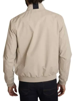Blouson sable uni avec une coupe droite et des poches zippées