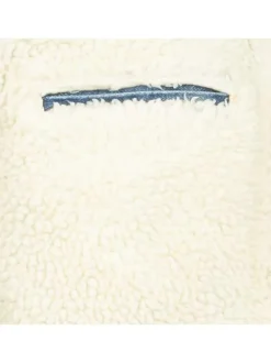 Blouson sherpa fourré en coton bleu jean avec une coupe droite