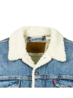 Blouson sherpa fourré en coton bleu jean avec une coupe droite
