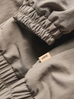 Blouson taupe uni à coupe légèrement oversize avec un col à revers côtelés
