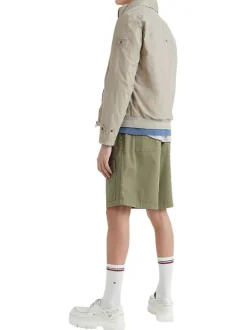 Blouson zippé beige uni avec une coupe droite et un col montant