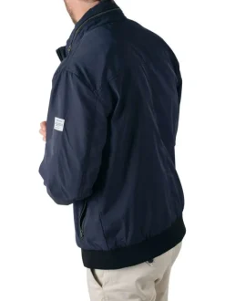 Blouson zippé marine uni avec une coupe droite et un col montant
