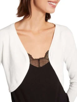 Boléro blanc uni avec une coupe droite col v et à manches longues