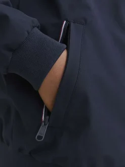 Bomber marine uni à coupe ajustée avec liseré tricolore sur le col