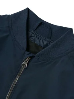 Bomber nylon bleu marine uni à coupe droite avec une poche zippée sur le bras