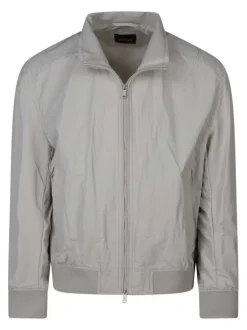 Bomber beige uni avec une coupe droite fluide et un col montant