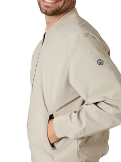 Bomber beige uni pourvu d'une coupe droite et d'un col montant