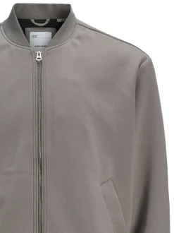 Bomber gris uni à coupe ajustée avec 2 poches raglan et fermeture zippée