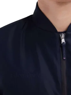 Bomber manches longues marine uni avec une coupe droite et un col montant