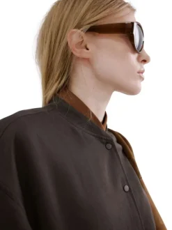 Bomber marron uni avec une coupe droite et un col rond en bord-côte