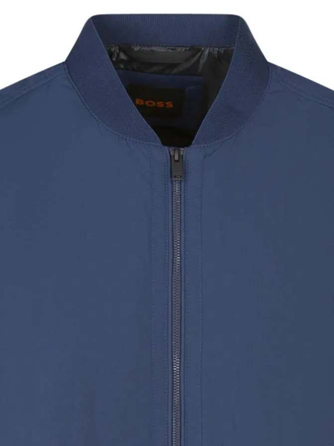 Bomber zippé bleu uni avec une coupe oversize et un col rond