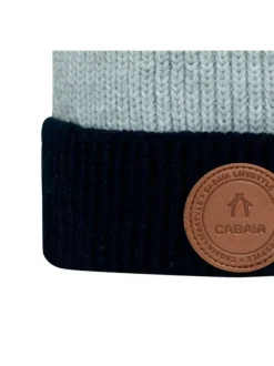 Bonnet Bella Luna marine rayé avec pompons et à revers avec patch de la marque