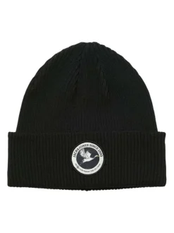 Bonnet en coton noir uni en maille avec un patch sur le revers