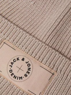 Bonnet beige uni en coton avec le logo de la marque cousu sur la face avant