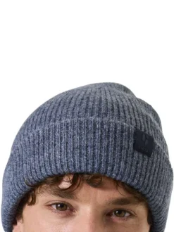 Bonnet bleu uni en maille côtelée avec un large revers