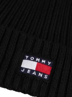 Bonnet en coton biologique noir uni avec un logo cousu à l’avant