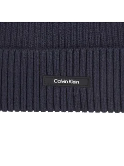 Bonnet en coton marine uni avec nom iconique de la marque à l'avant