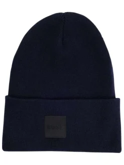 Bonnet en coton marine uni avec patch noir du logo de la marque sur le revers