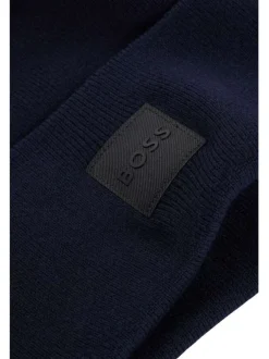 Bonnet en coton marine uni avec patch noir du logo de la marque sur le revers