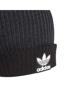 Bonnet noir à pompon et à revers avec logo cousu à l'avant