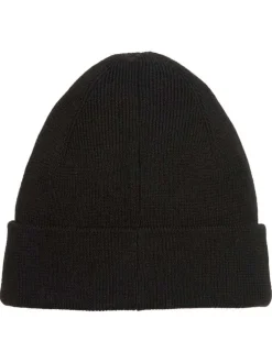 Bonnet noir uni en maille fine avec un patch brodé sur le revers