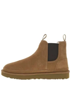 Boots en cuir camel à talon plat pourvues de soufflets élastiqués