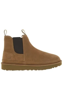 Boots en cuir camel à talon plat pourvues de soufflets élastiqués