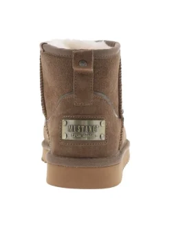 Boots en cuir de vachette beige, fourrées en laine, à semelle plate adhérente