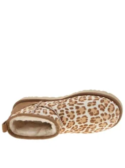 Boots en cuir léopard à talon plat avec languette d’aisance à l’arrière