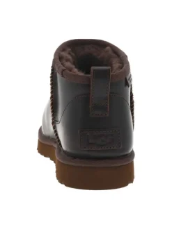 Boots en cuir marron à talon plat avec une doublure en fausse fourrure