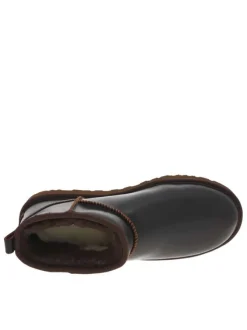 Boots en cuir marron à talon plat avec une doublure en fausse fourrure