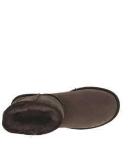Boots en cuir marron à talon plat avec une doublure en fourrure
