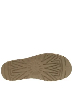 Boots en cuir naturel à talon plat avec intérieur fourré et patch de la marque